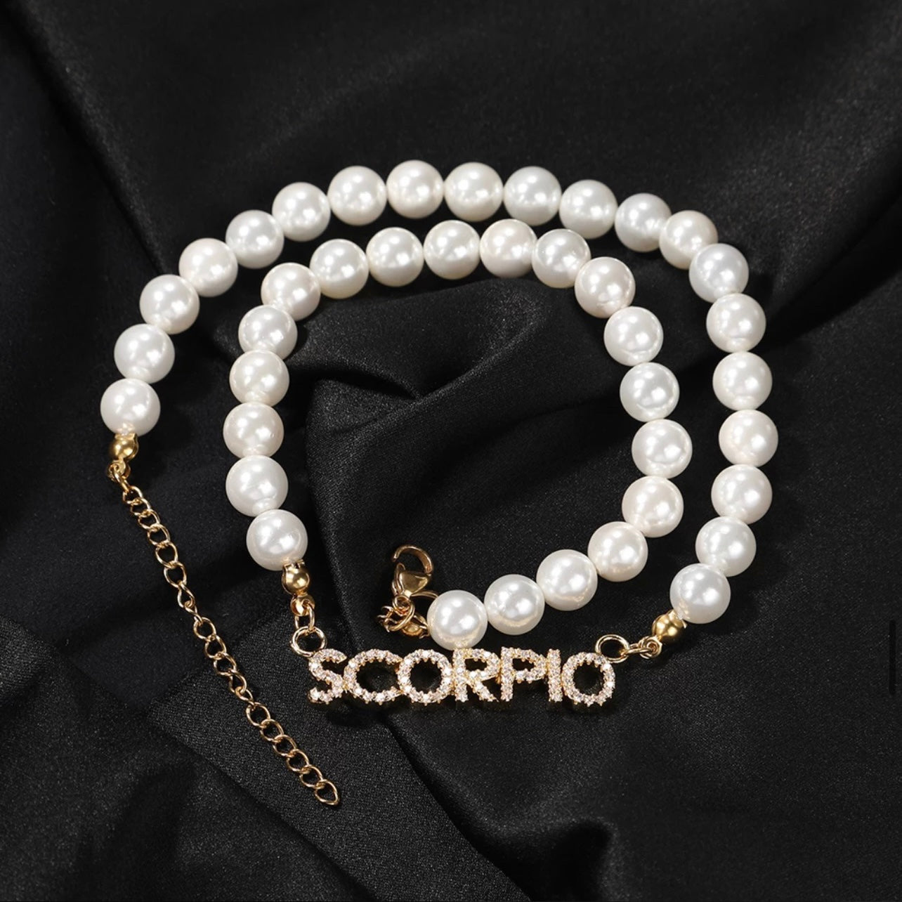 Pearl zodiac necklace